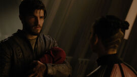Cor-Vex being held by his father for the first time.