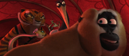 Monkey hiding with Po and the other Five in Kung Fu Panda 2