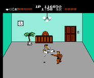 Kunio fighting against Sabu in his office.