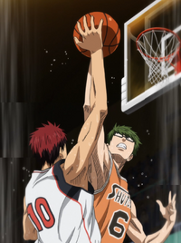 Kagami and Midorima jump to get the shot