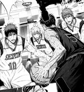 Aomine is cornered by three players from Seiren