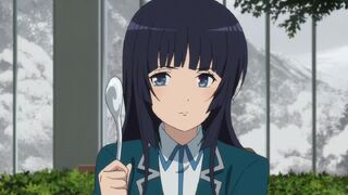 Muetta in school uniform with spoon