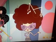 Music's hair's frizzed