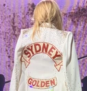 For the mainland European and Australian shows, the city in which the show was performed was emblazoned on the back of the jacket