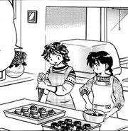 Sakura cooking chocolate with her mother for Valentines Day
