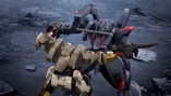 Ghost using one of its sub-arms to block an enemy's attack.