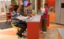 Leo giving Adam, Bree and Chase breakfast