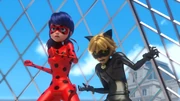 Ladybug and Cat Noir trapped under a pyramid.