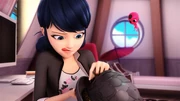 Marinette working on a derby hat.