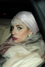 Vuitton brown slicked-back with headpiece