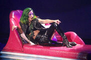 996b5020-d525-11e3-b202-8d0a2e265190 lady-gaga-tour-pictures-outfit-dread-locks-pvc-swimsuit-white-chair