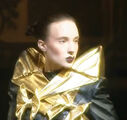 Jeremy Scott Spring 1999 Gold Sholdered Black dress
