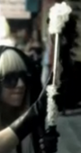 Gaga opening the Disco Stick as seen in The Fame: Part One