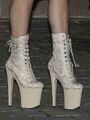 Beige/nude lace-covered boots