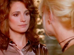 Madeline presents herself as a mother figure to a newly recruited Nikita.