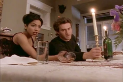 At the last minute, Michael prevents Elena from drinking the poisoned wine.