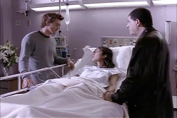 A recovering Elena with Michael and her father.
