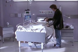 Michael checks in on a sick Elena