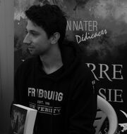 Quentin Nater Auteur Salon du livre - St-Pierre-De-Clages 2023 La Guerre de l'Hérésie Photo de Jean-Michel Reuteler