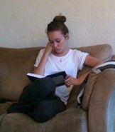 Alycia reading a book