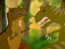 The Plated Sharptooth slashes Chomper's Mother's legs