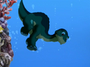 Littlefoot falls into the water