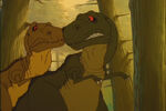 Papa Sharptooth confides his concerns for Chomper to his wife.