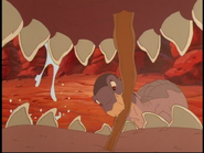 Littlefoot props a stick in the Allosaurus's mouth during the film's climax, planning to steal one of his teeth.