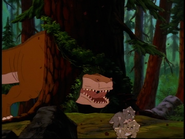 The sharptooth gets his head stuck in a redwood tree.