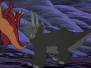 Topps fights off a Velociraptor