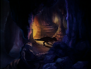 Sharptooth enters a cave