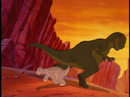 The Sharptooth chases Littlefoot.