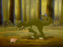 The sharptooth, after being rammed by Cera, with Chomper biting his tail