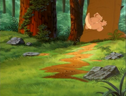 Cera rams into the Allosaurus' foot, thinking it's a tree trunk.
