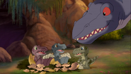 The Sharptooth mother greets her newborn children.