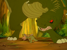 The kids run under the sharptooth's legs to escape