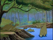 The Iguanodon and his herd at the dry riverbed.