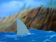 The sharptooth makes one last appearance in the water during the climax