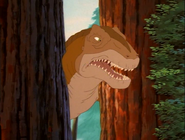 The sharptooth gets his head stuck in between two more trees.