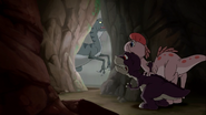 Chomper and Ruby hide from the sharpteeth in a small cave