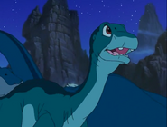 14-Littlefoot tells his grandparents about the flying rock he just saw