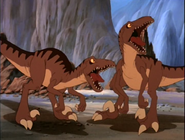 The Velociraptor threaten the group (offscreen)