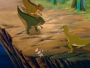 Papa and his mate prepare to fight the Plated Sharptooth