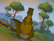 The female sharptooth appears before the two Corythosaurus
