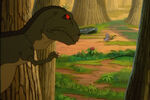 Papa Sharptooth, witnessing his son gathering food for the main characters.