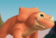 Cera as she appears in The Land Before Time: Big Water Adventure