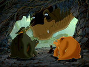 Pat finds Littlefoot's friends in a small cave.