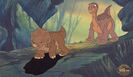 Littlefoot and Cera argue about a hopper