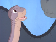 IV-09-Littlefoot tells his grandparents about the Longneck herd he just saw