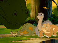 Papa Sharptooth sniffs Spike